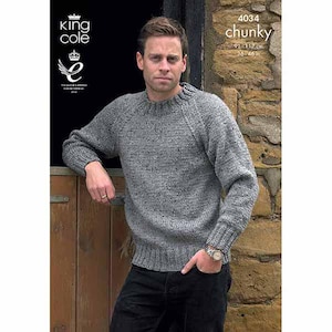 May include: A grey, chunky knit sweater with a crew neck. The sweater is worn by a person. The image also includes the text "4034 chunky" and measurements of 91-117 cm. The King Cole logo is visible in the upper left corner.