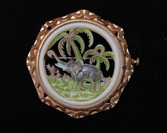 Vintage Octagon Gold Tone Carved Celluloid Elephant Brooch