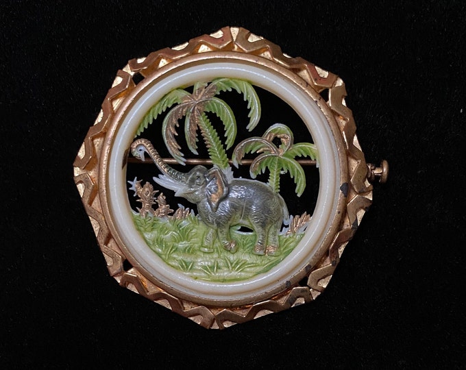 Vintage Octagon Gold Tone Carved Celluloid Elephant Brooch