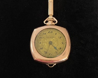 Lovely Classic 10KT Gold Delmar Swiss 15 Jewel Pendant-Wrist Watch