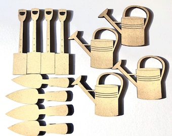 May include: A set of wooden craft supplies for gardening, including four shovels, five trowels, and four watering cans. The items are all unpainted and ready to be decorated.