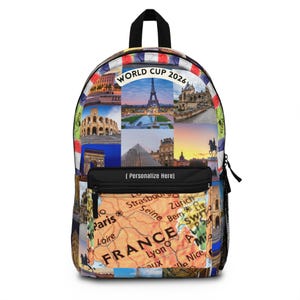 May include: A backpack featuring a collage of French landmarks including the Eiffel Tower, the Louvre, and the Arc de Triomphe, with the text WORLD CUP 2026 at the top. The front pocket displays a map of France and the text (Personalize Here).