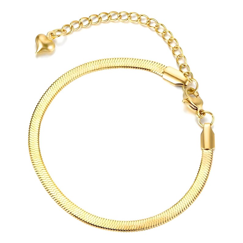 May include: A gold-tone snake chain bracelet with a heart-shaped charm attached to the lobster clasp.