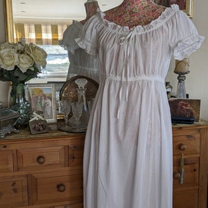 Victorian style Chemise/ Night Gown, beautifully made in pure white cotton with a delicately gathered neckline & attractive puffed sleeves.