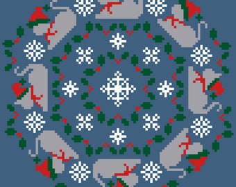 May include: A blue background with a white pixelated design of a wreath with cats wearing Santa hats, snowflakes, and holly. The word "DECEMBER" is written in white below the wreath.