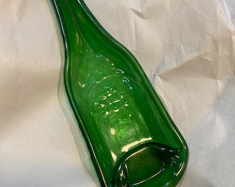 Melted green  beer bottle spoon rest