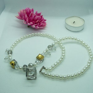 Silver box-framed crystal with faux pearls