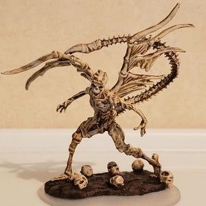Painted Bone Devil D&D Pathfinder Tabletop Miniature on a Clear Base with Skulls