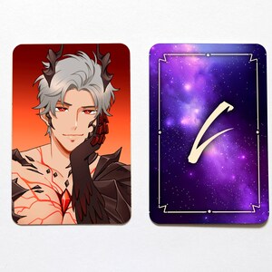 May include: Two rectangular cards. The left card features an anime-style character with silver hair, red eyes, and dark horns against an orange background. The right card displays a purple and blue galaxy pattern with a white stylized symbol in the center.