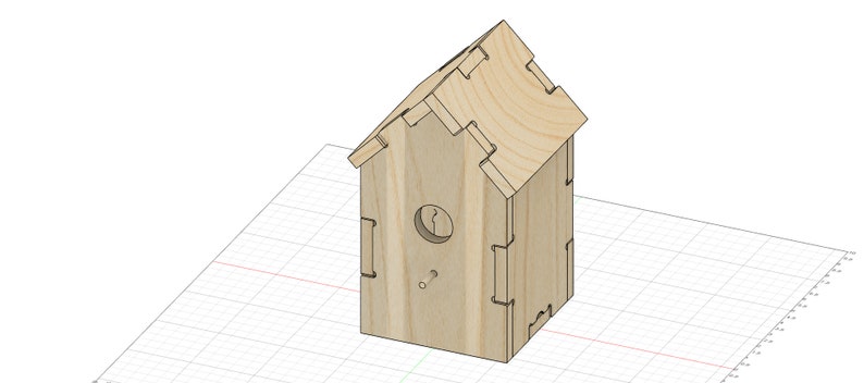 Puede incluir: Una casita de p&aacute;jaros de madera con un techo a dos aguas y un agujero de entrada redondo. La casita est&aacute; hecha de madera marr&oacute;n claro y tiene un dise&ntilde;o sencillo.