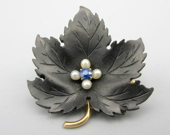 Antique 14k gold and carved black stone leaf brooch with pearl and sapphire center