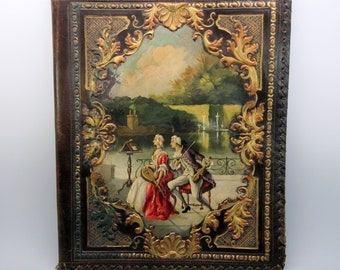 1900's Large embossed leather sheet music holder with painted musician scene