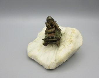 Great antique Vienna bronze figurine of Children on a sled sledding down a snowy hill