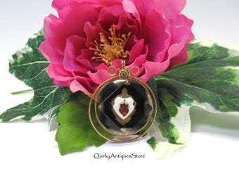 Vintage 1940's old store stock lucite & enamel Sacred Heart pendant circular with black background