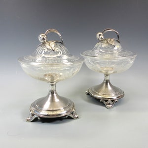 Pair of antique French silver and engraved crystal glass lidded compotes with cherries and leaves