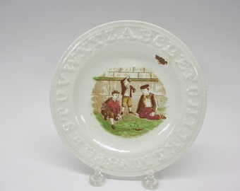 Antique Staffordshire pottery alphabet ABC plate with boys playing game of marbles