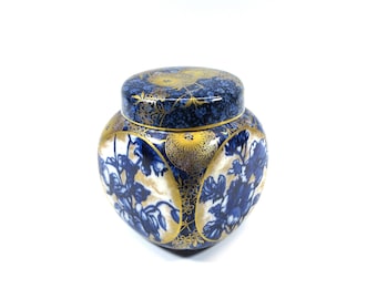 Antique Royal Doulton Burslem pottery flow blue and gilded lidded ginger jar