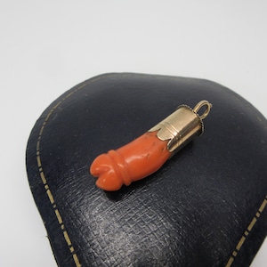 Antique 14k gold and human molar tooth shaped coral pendant