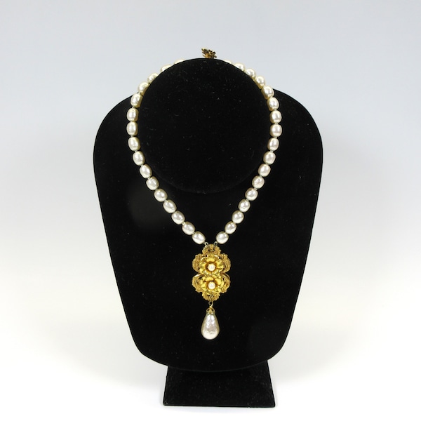 Opulent vintage Miriam Haskell costume pearl necklace with double gilded flower