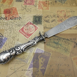 Antique Swedish silver letter opener with dragon handle and engraved blade