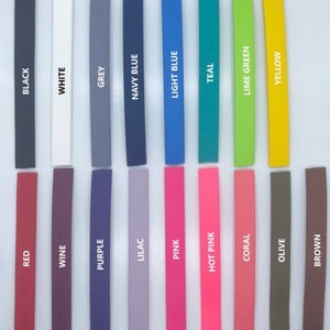 May include: A color chart showing 18 different colors of polymer clay. The colors are arranged in two rows of nine. The colors are: black, white, grey, navy blue, light blue, teal, lime green, yellow, red, wine, purple, lilac, pink, hot pink, coral, olive, and brown.