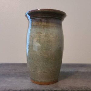 Green, Red, and Blue Pottery Vase 6 inches by 3 and three fourths inches