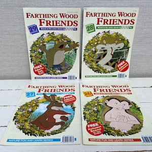 May include: Four colorful children's books featuring illustrations of animals from the Farthing Wood series. Each book has a different number, 26, 27, 28, and 29, and the title "Farthing Wood Friends". The books are all the same size and have a green and white background.
