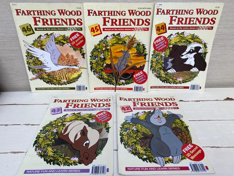 May include: Five colorful magazine covers featuring illustrations of animals from the Farthing Wood children's book series. The covers are numbered 42, 43, 44, 45, and 46. Each cover features a different animal, including a badger, a horse, a mole, a mouse, and a crane. The covers are all in a nature-themed design with green leaves and flowers.