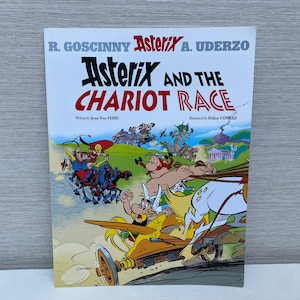 Astérix y la carrera de carros por R Goscinny y A Uderzo 2018 Libro de bolsillo