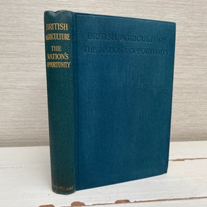 May include: A dark blue hardcover book with the title "British Agriculture: The Nation's Opportunity" on the spine and front cover.