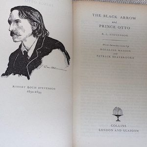 May include: An open book featuring a black and white portrait of Robert Louis Stevenson and the title "The Black Arrow and Prince Otto." The book's pages are aged, with text and illustrations.