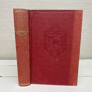 May include: A red hardcover book with gold lettering on the spine that reads "The Practical Man's Book of Things to Make and Do".