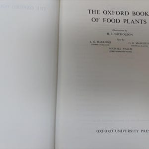 May include: Open book titled "THE OXFORD BOOK OF FOOD PLANTS" with text by B.E. Nicholson, S.G. Harrison, G.B. Masefield, and Michael Wallis. Published by OXFORD UNIVERSITY PRESS. The book is open to a double-page spread.