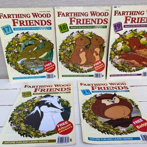 May include: A set of five Farthing Wood Friends children's books based on the BBC TV series. The books feature colorful illustrations of animals from the show, including a badger, an owl, a squirrel, and a fox. Each book has a different number, from 17 to 21, and includes a free poster or album stickers.