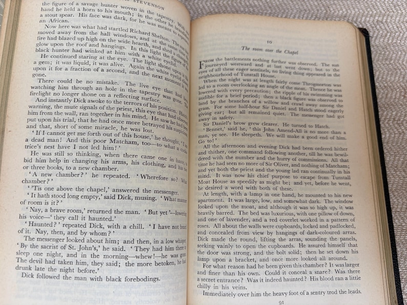 May include: Open book with text on aged paper. The pages display printed text, with the words "STEVENSON" and "The room in the Chapel" visible. The book is open to a double-page spread.