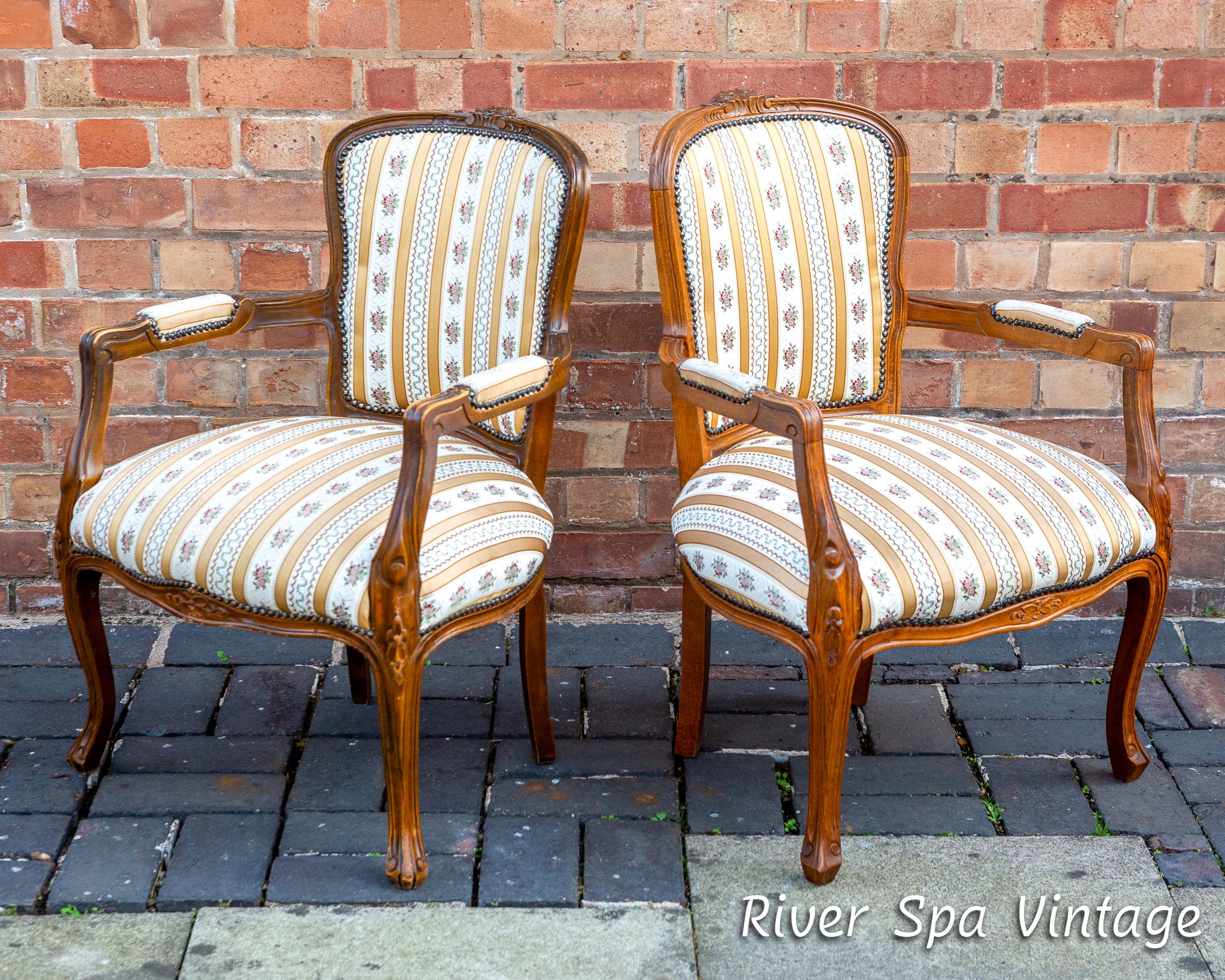 Antique pair of French Louis XV style side chairs.