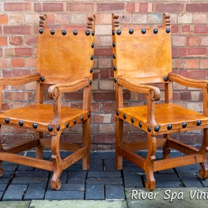 Mexican Leather Throne Chairs Pair of Spanish Colonial Baroque Style Vintage Spanish Studded Leather Pine Carver Dining Chairs Vintage MCM