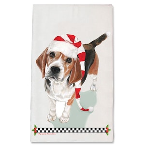 May include: A Beagle dog wearing a red and white Santa hat with a white pom-pom. The dog is standing on a light green background.