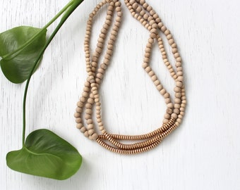 natural wood beads necklace. layering three strand sophisticated artsy gold wood beads necklace.  Boho ethnic Sezane beads necklace