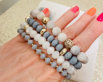Set of 4 strand layering crystal natural rose quartz stone beaded bracelet. Boho Gold subtle disk beads bracelet.Hippie tassel bracelet