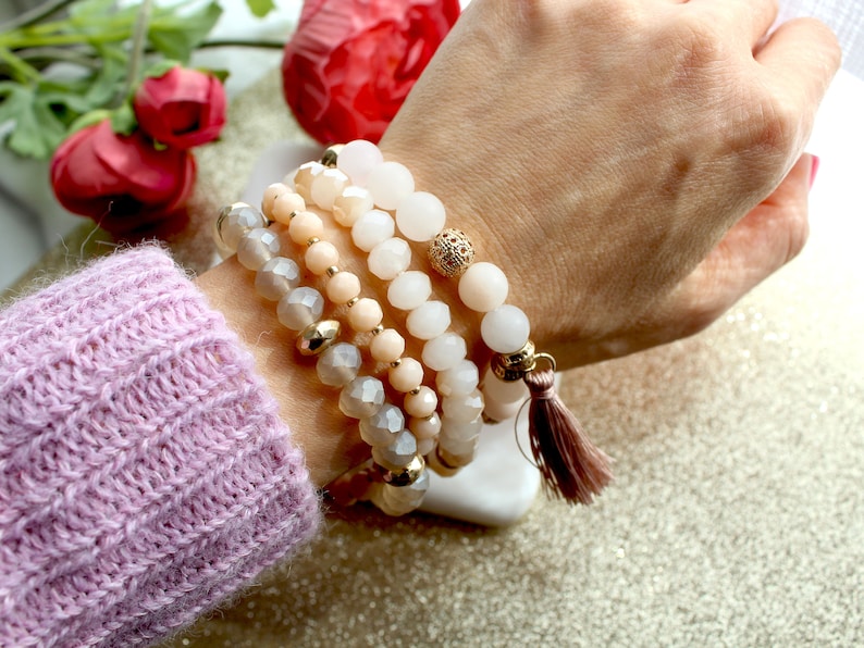 Set of 4 strand layering crystal natural rose quartz stone beaded bracelet. Boho Gold subtle disk beads bracelet.Hippie tassel bracelet image 2