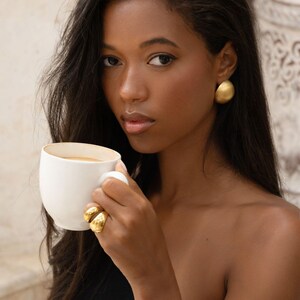 vintage earrings styled casually