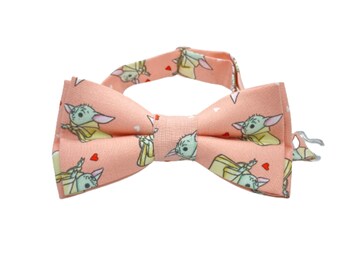 The faces of the Child Baby Yoda pre-tied bow tie adult sized 