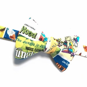 Gravata borboleta masculina com tema Disney vintage edição especial. Gravata borboleta pré-amarrada ajustável de até 19". Gravata borboleta exclusiva feita à mão em quadrinhos