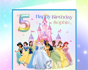 May include: A pink and white castle with a rainbow number 5 and the text "Happy Birthday Sophie" surrounded by Disney princesses.