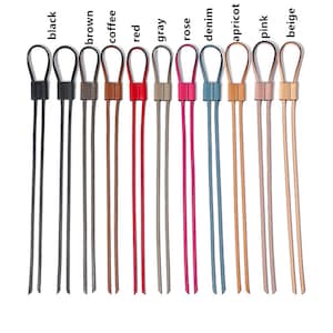 May include: Ten leather cords in various colors, including black, brown, coffee, red, gray, rose, denim, apricot, pink, and beige. Each cord has a loop at the top and is approximately 30 inches long.