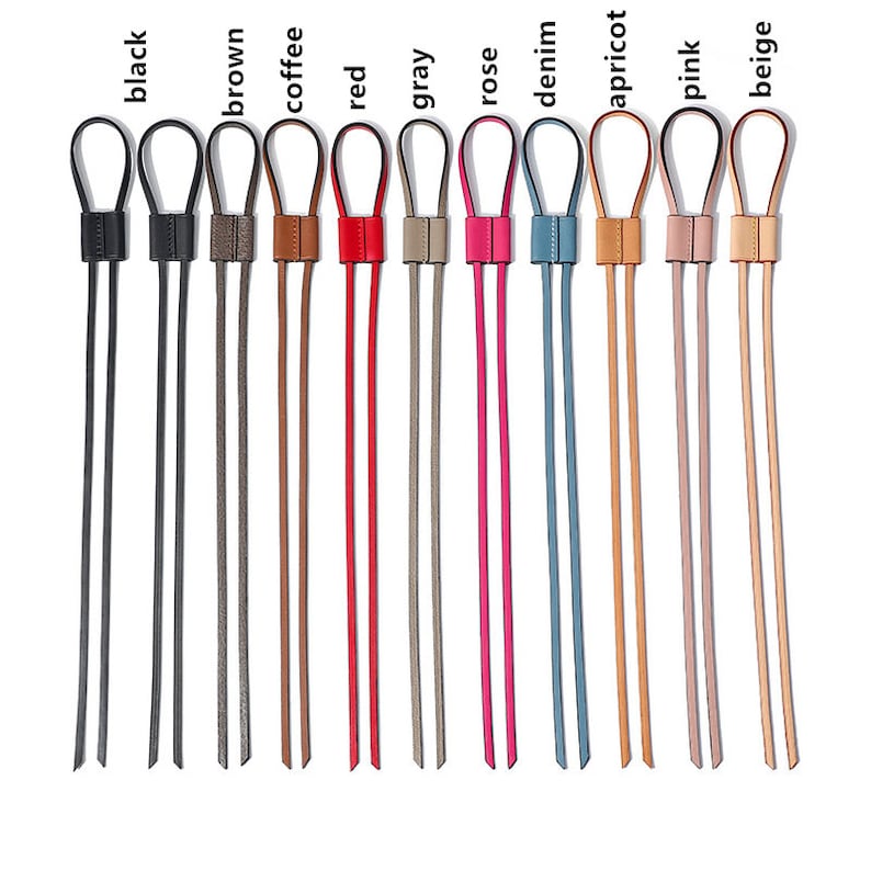 May include: Ten leather cords in various colors, including black, brown, coffee, red, gray, rose, denim, apricot, pink, and beige. Each cord has a loop at the top and is approximately 30 inches long.
