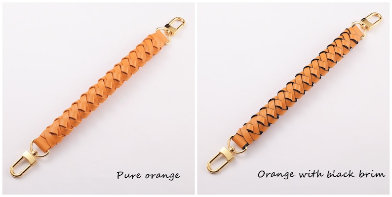 May include: Two braided leather straps with gold clasps. The strap on the left is solid orange. The strap on the right is orange with a black trim.  "Pure orange" and "Orange with black brim" are written below the straps.