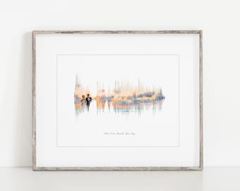 Puede incluir: Una impresión enmarcada de una pareja de bodas de pie en una playa al atardecer. La imagen es una visualización de ondas sonoras de la canción "When I Come Around" de Green Day.