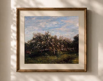Puede incluir: Una pintura al óleo cuadrada enmarcada que representa un huerto exuberante con árboles en flor bajo un cielo azul suave con nubes blancas. La obra está dentro de un marco de madera marrón texturizado con un borde ancho de color blanco roto.